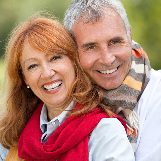 Smiling older woman outdoors